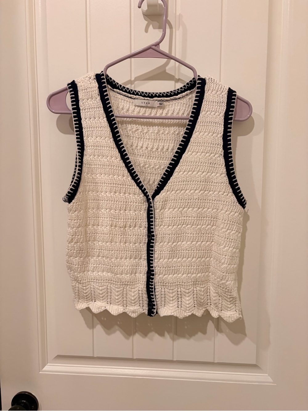 Lush Cream Crochet Sleeveless Cardigan with Black Trim